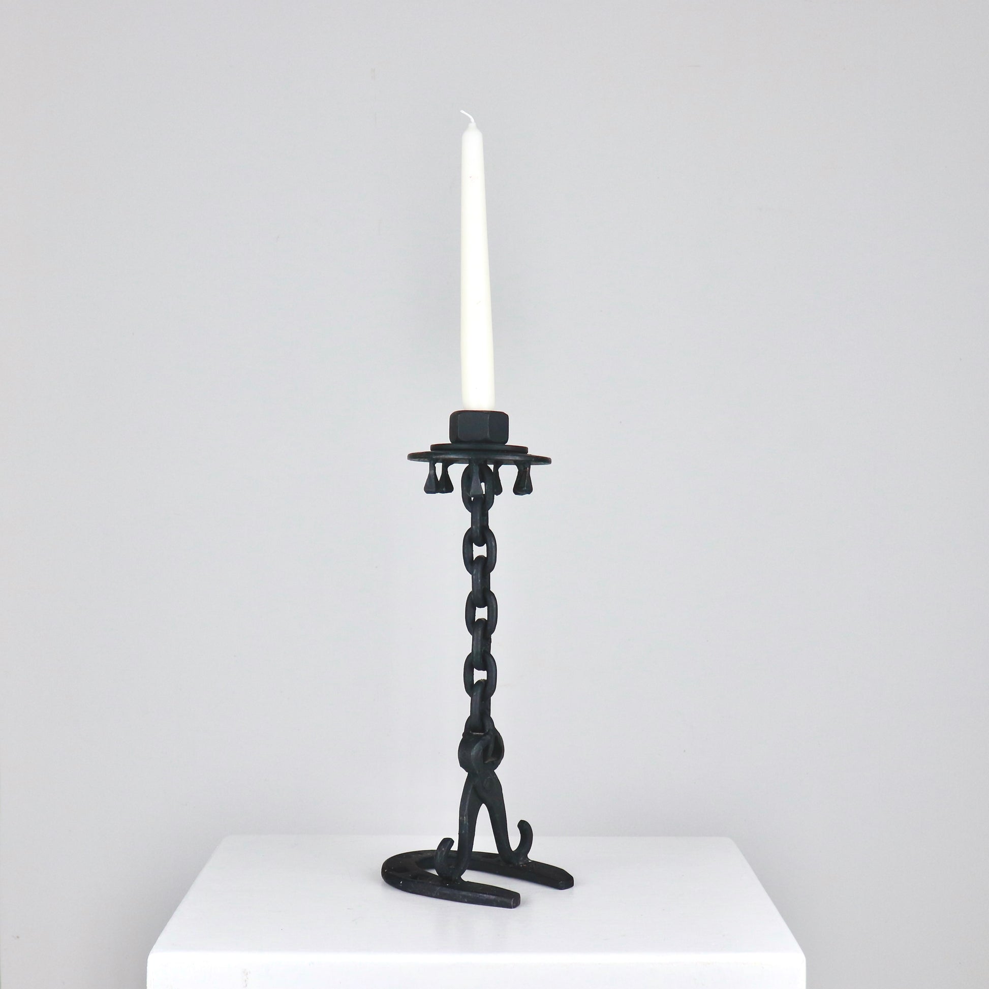 Blacksmith-made forged iron candlestick with chain link stem, height 31 cm