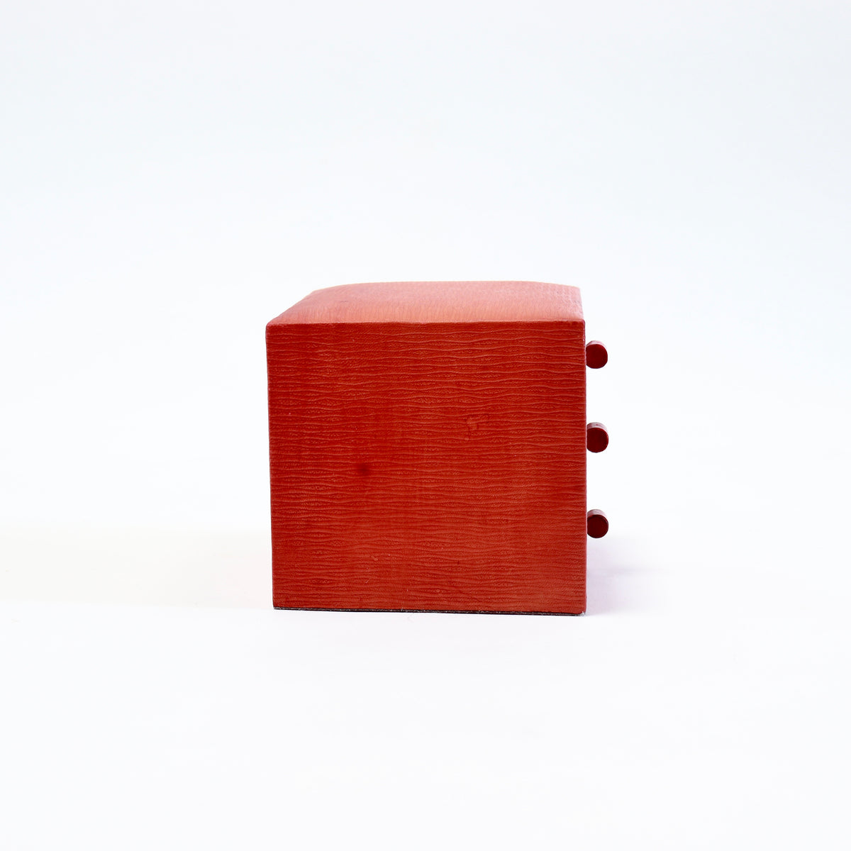 - Side view of the compact three-drawer jewellery box