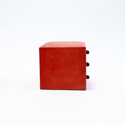 - Side view of the compact three-drawer jewellery box