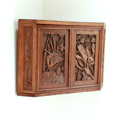 Hand carved wooden corner cupboard with fairy panels