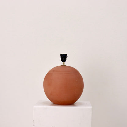 Side view of spherical terracotta base