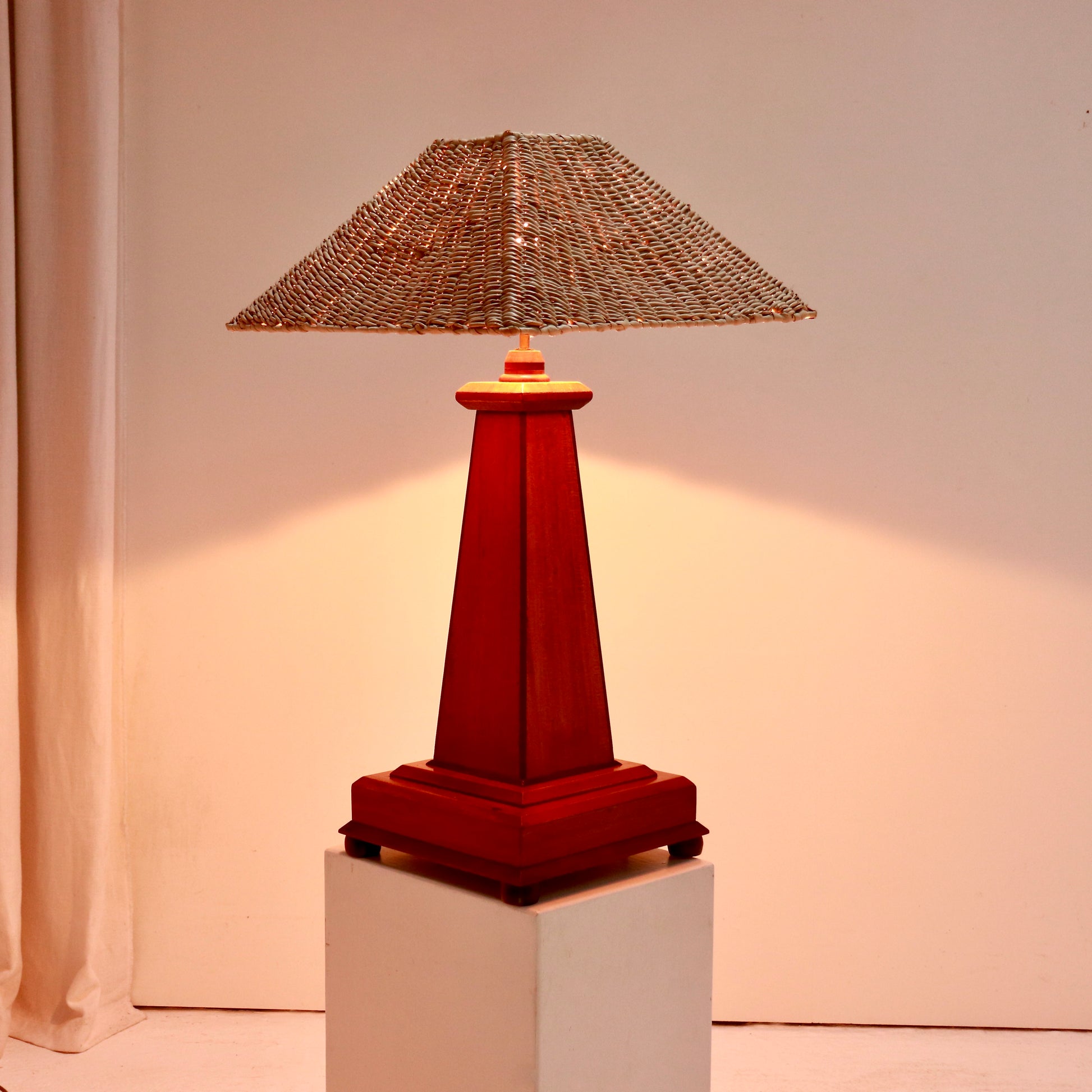 Large wooden table lamp illuminated
