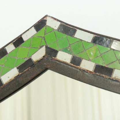 Detail showing hand-cut mosaic pattern and patina