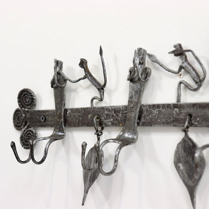 Decorative iron coat rack with leaf details