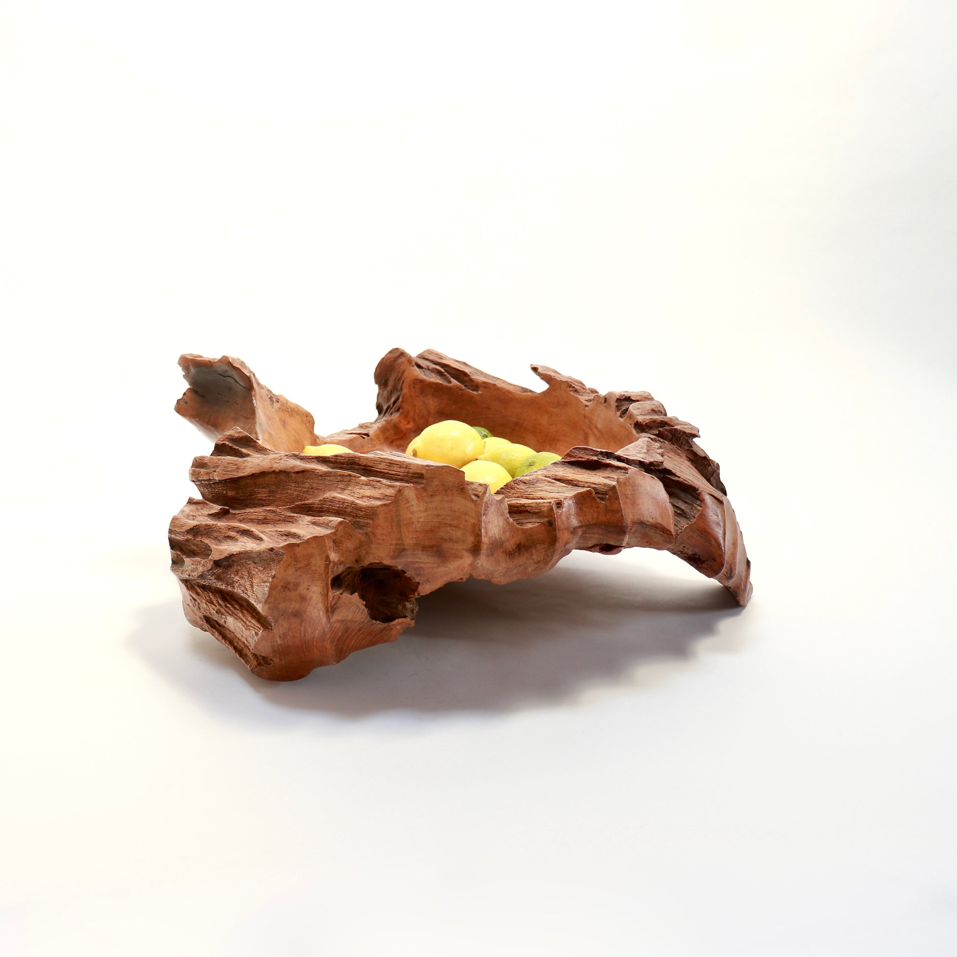 Hand-carved wooden fruit bowl with natural edges