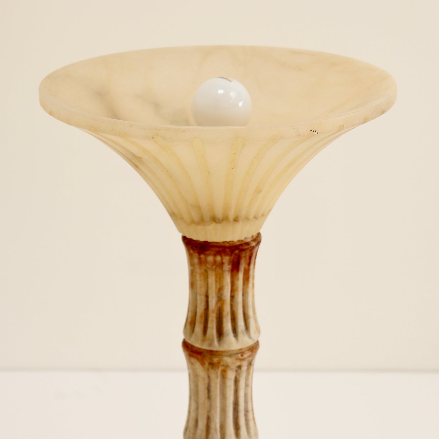 Sculptural carved alabaster table lamp.