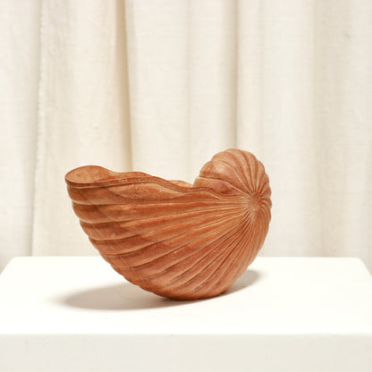 - Rear view of the sculptural wooden shell bowl
