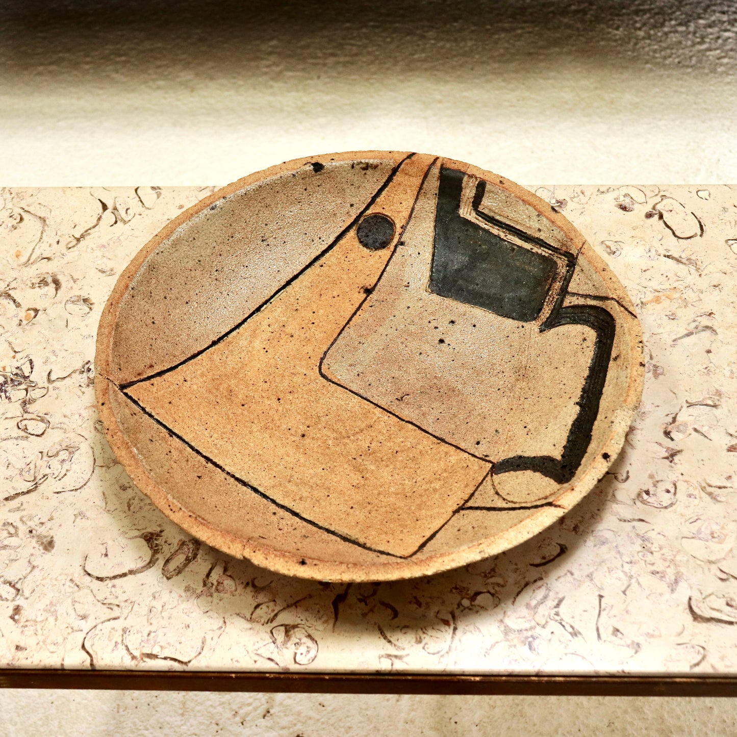 Vintage ceramic platter with modernist decoration