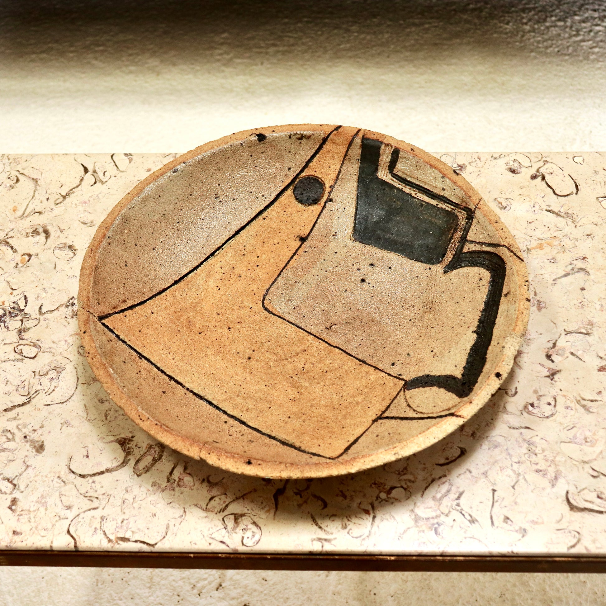 Vintage ceramic platter with modernist decoration