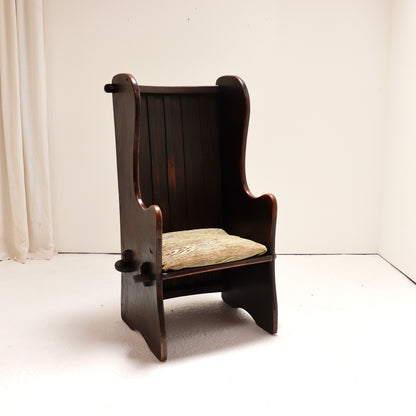Early 20th century chestnut lambing chair front view