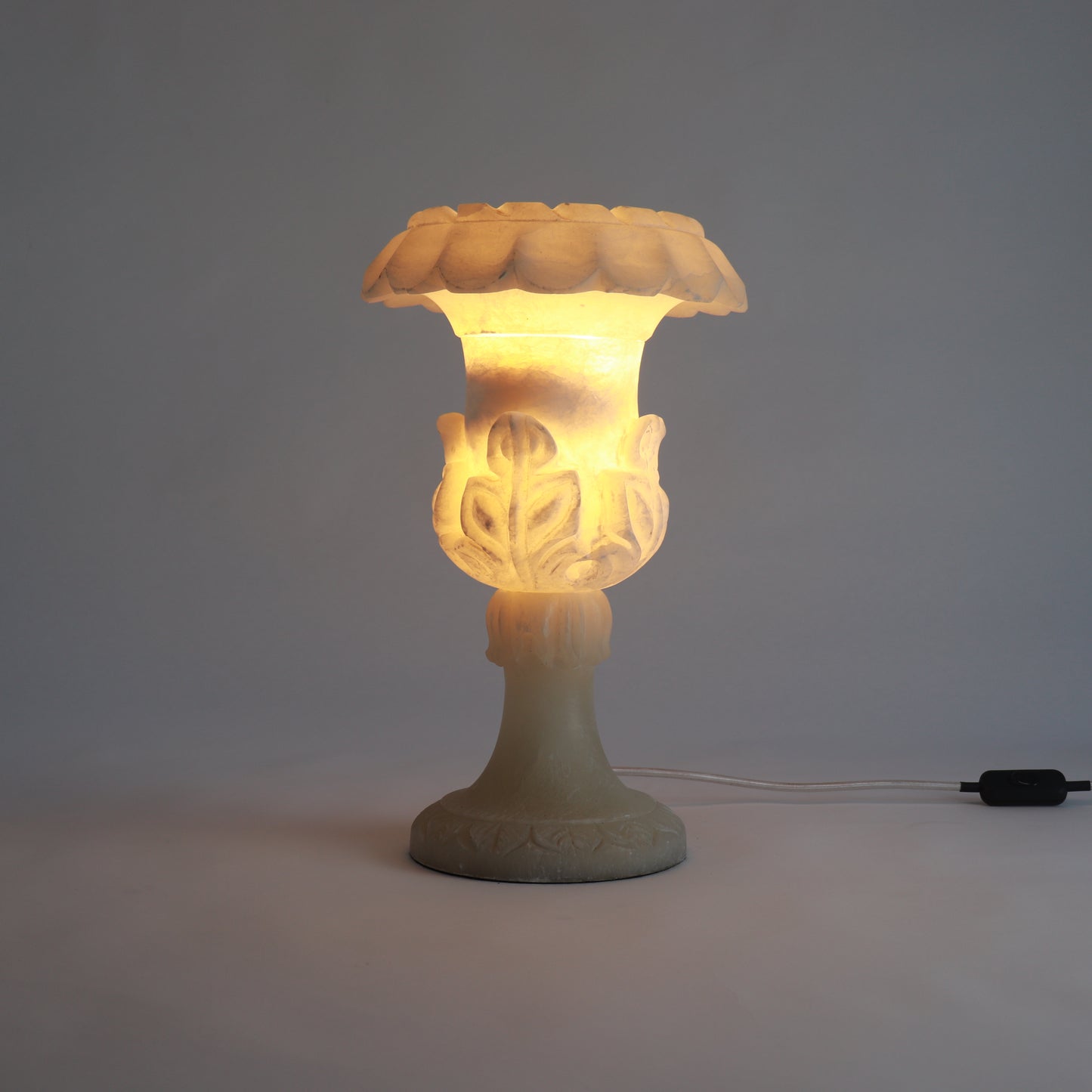 Classical alabaster urn lamp illuminated from within