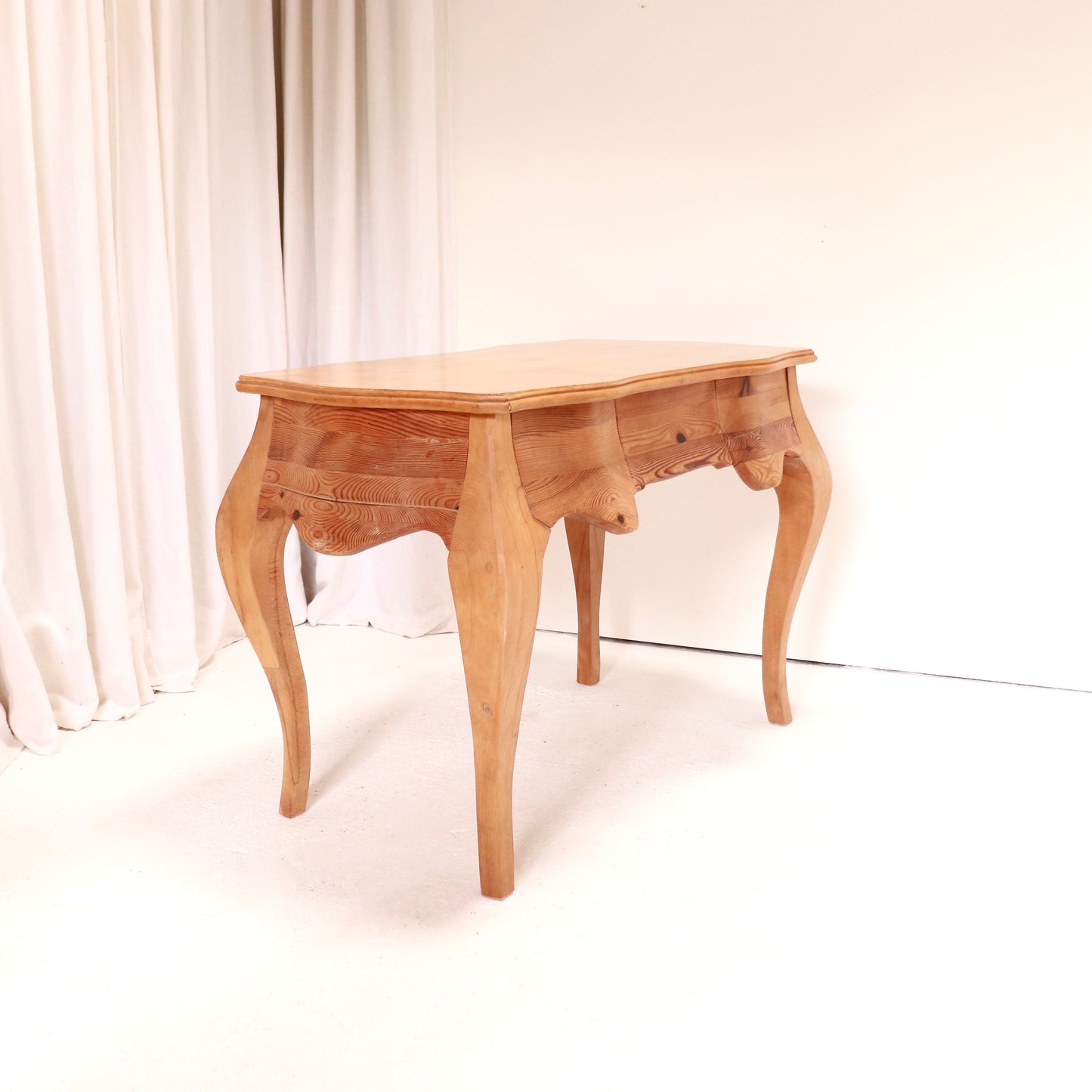 Sculptural mixed-wood desk with curved legs, late 20th century