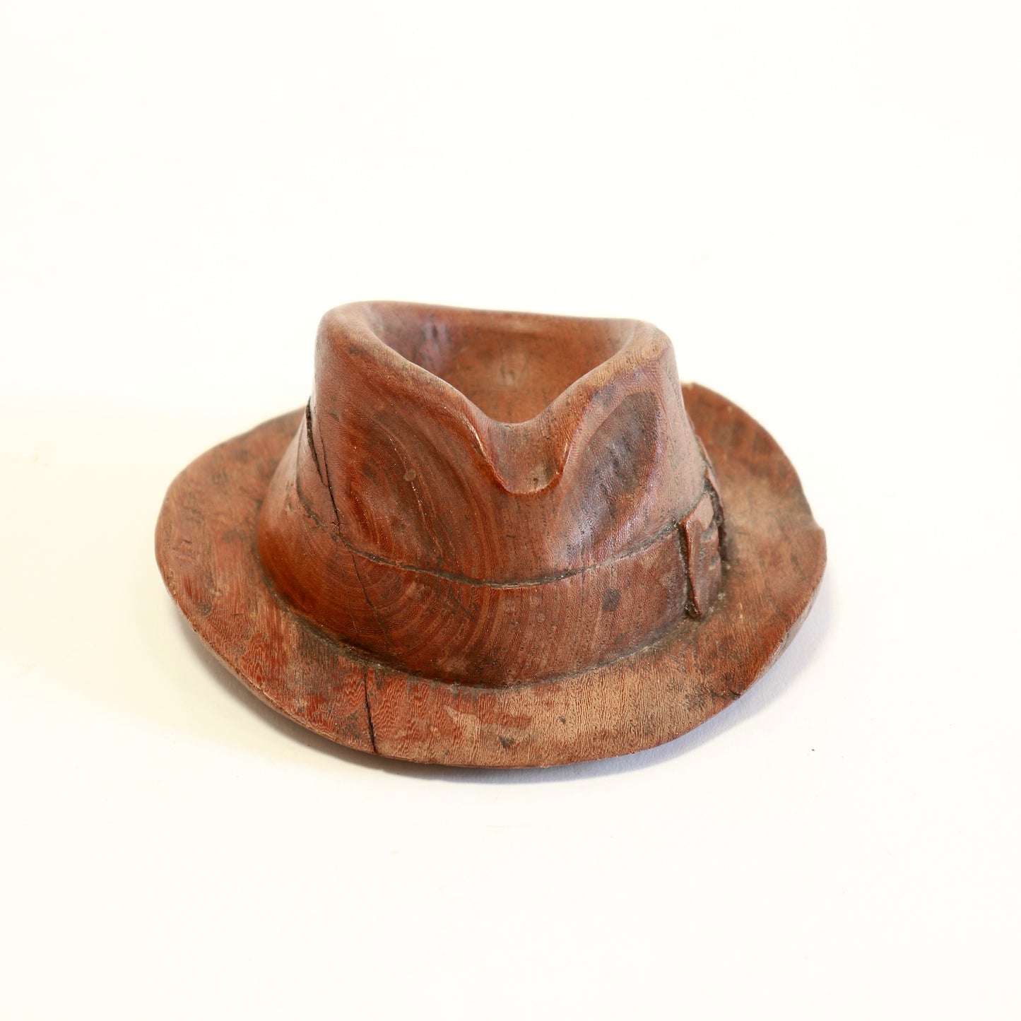 Vintage folk art carved wooden hat.