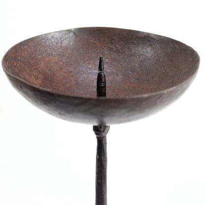 Close-up of iron bobeche and pricket spike