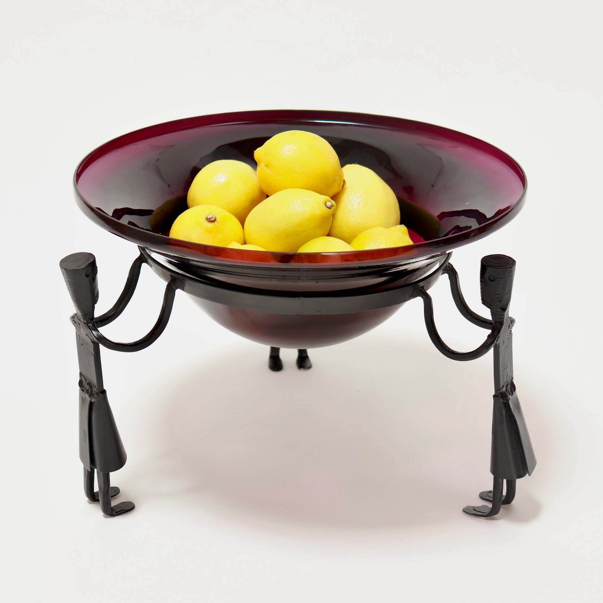 Vintage aubergine glass bowl with sculptural metal figures
