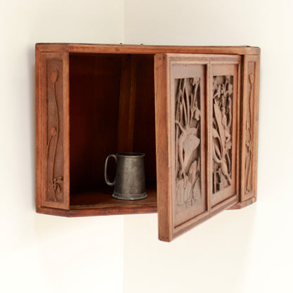 Interior view of vintage wooden corner cupboard