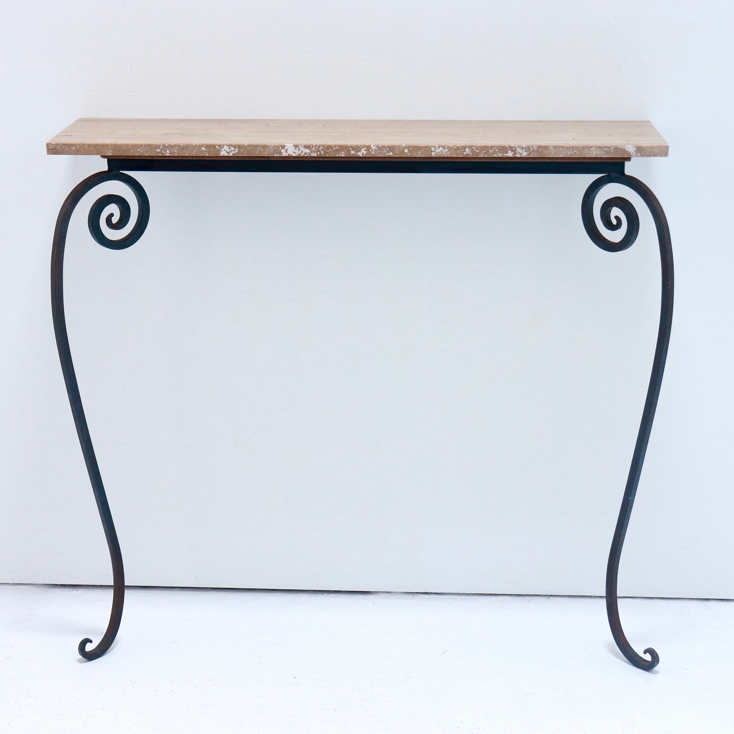 Wrought iron console with travertine stone top