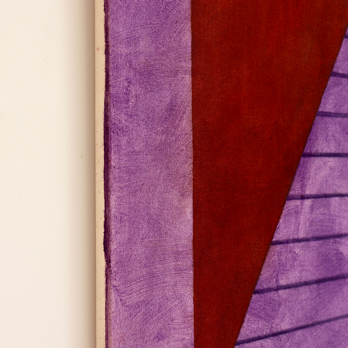 Side detail of John Mitchell’s Square Pyramid, Capped, showing the canvas edge, violet painted border and deep red ground.