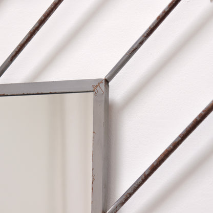 Postmodern steel mirror