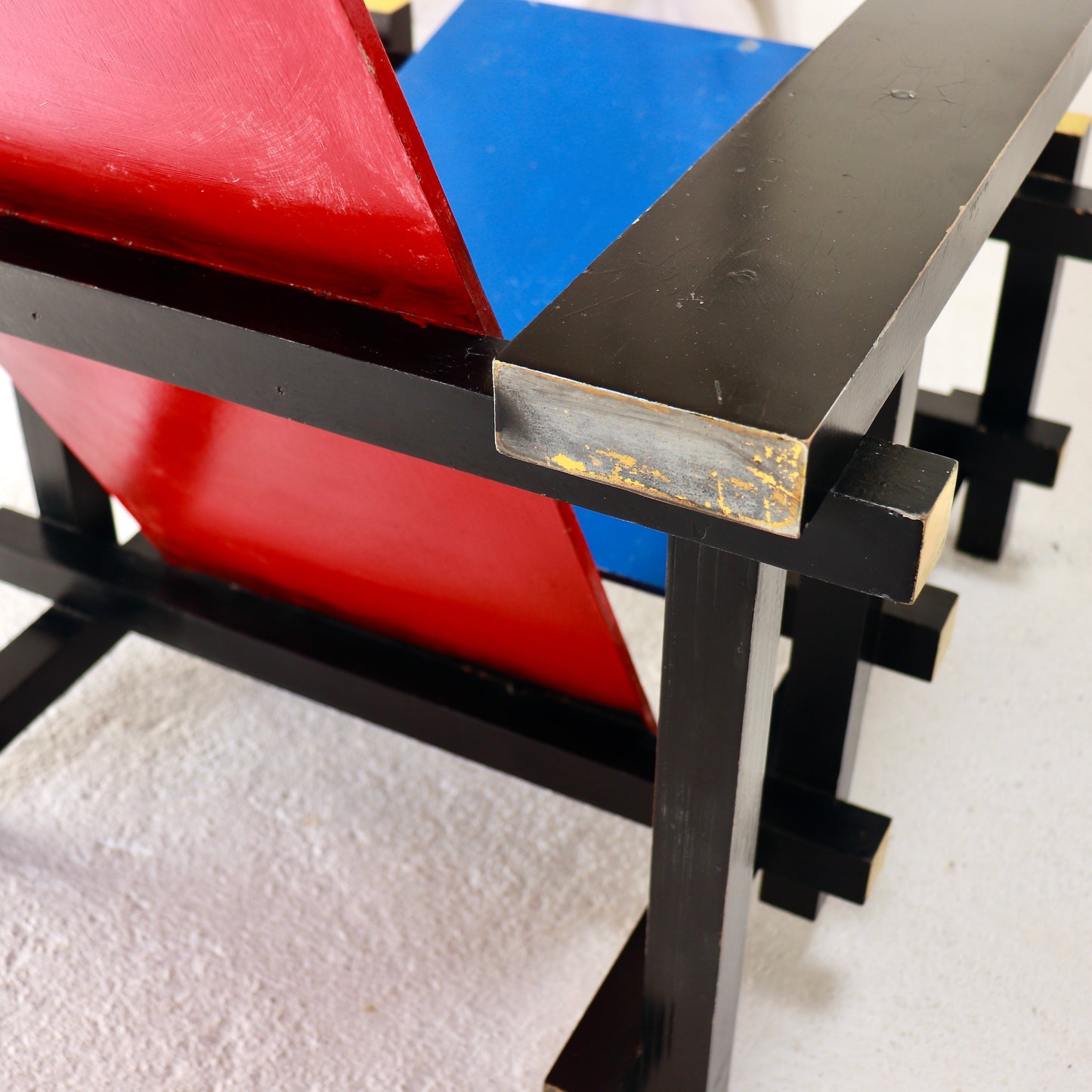 Vintage Red Blue Chair with original worn paint.