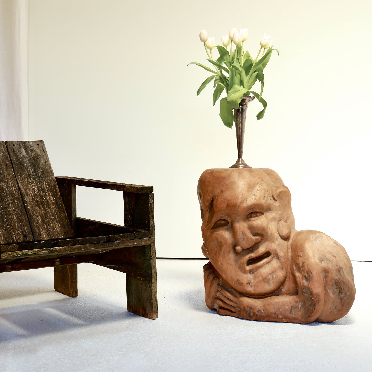 Hand-carved sculptural wooden side table with reclining figure