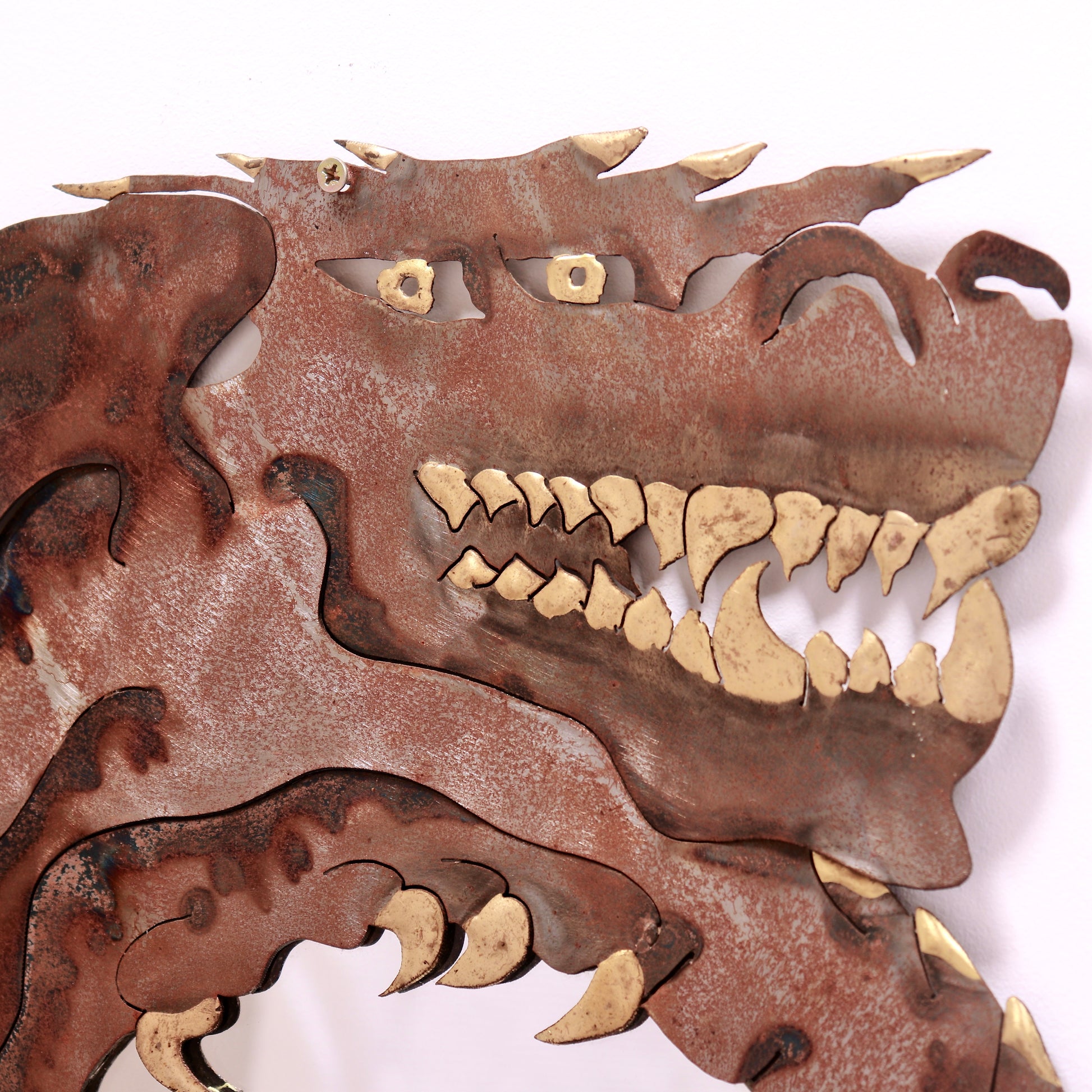 Hand-cut steel mirror featuring stylised dragon motif