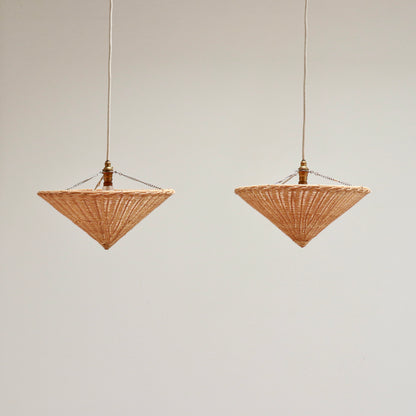 Pair of vintage rattan cone uplighter pendant lights hanging side by side