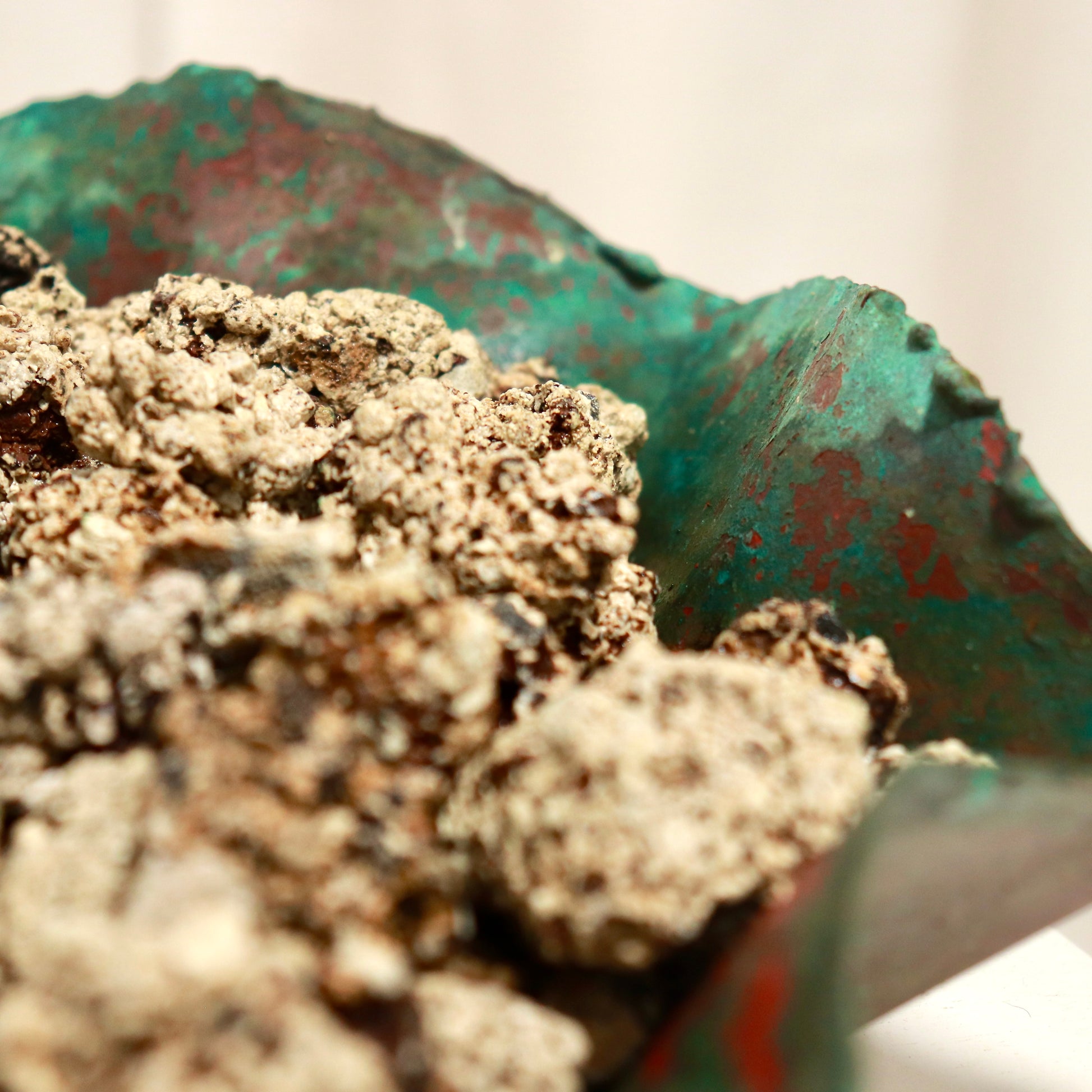 Detail of verdigris surface and hammered edges.