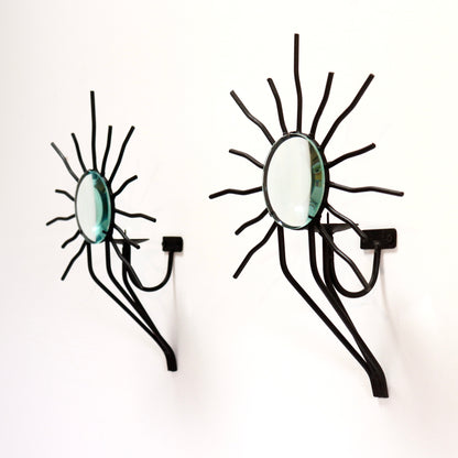 Sunburst wall sconces in the style of Andre Dubreuil