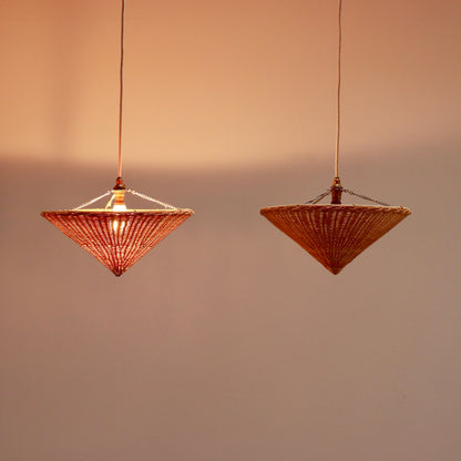 Rattan cone pendant uplighter showing warm woven texture and shape