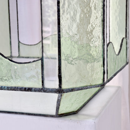 Detail of aged leadwork and textured glass panels