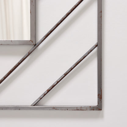 Postmodern steel mirror
