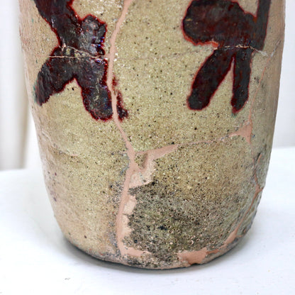 Restored antique ceramic with oxblood and green glaze