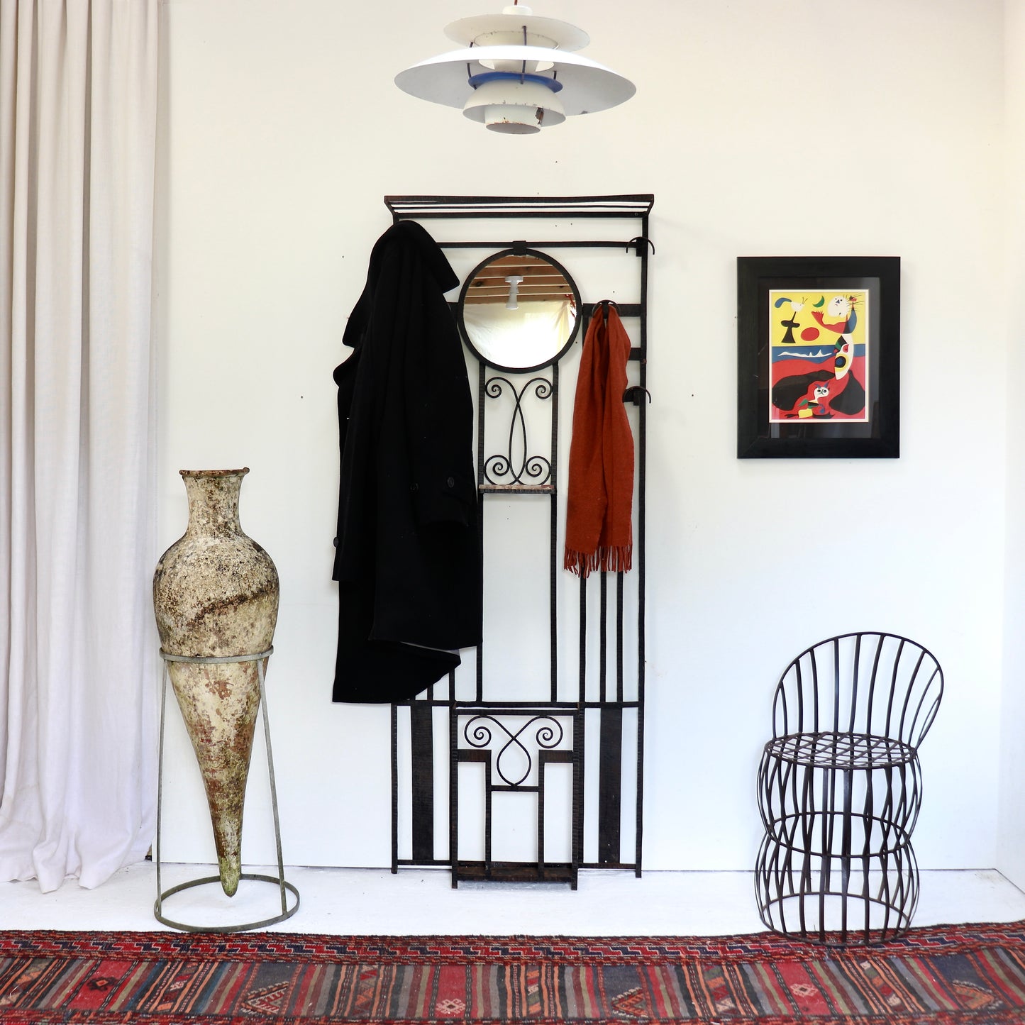 French wrought iron hall stand with circular mirror