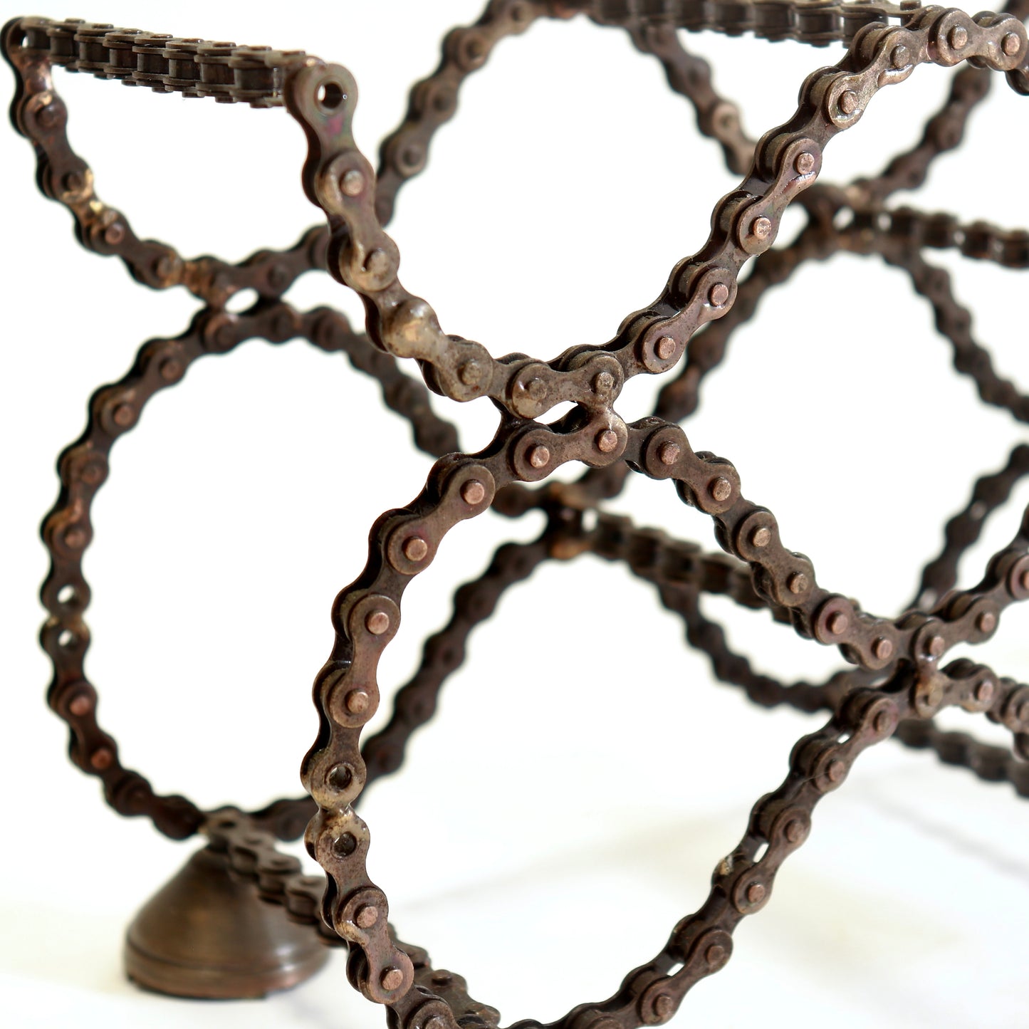 Close-up of reclaimed bicycle chain construction