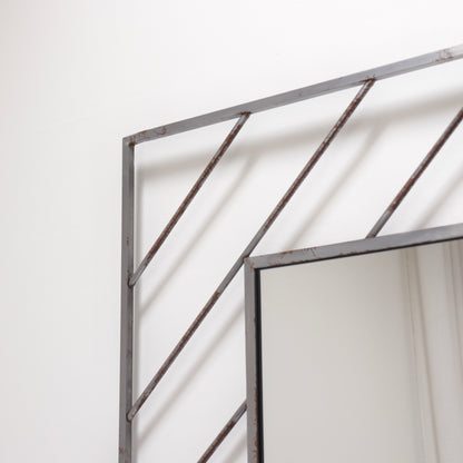 Postmodern steel mirror