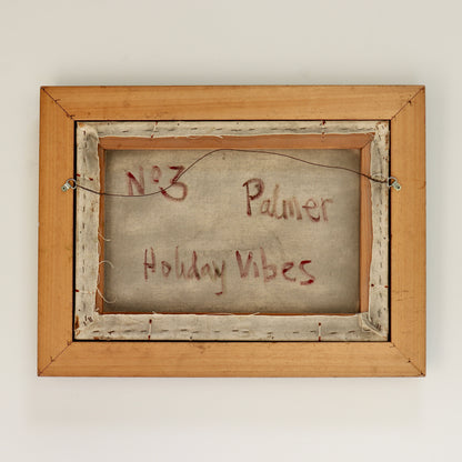 Wooden frame with 'No. 3 Palmer Holiday Vibes' text on a plain background