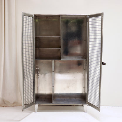Interior view of ex naval aluminium storage cabinet with shelves.