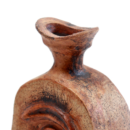 Detail of the Cornish pottery vessel’s narrow neck and irregular flared rim, with mottled brown surface decoration.
