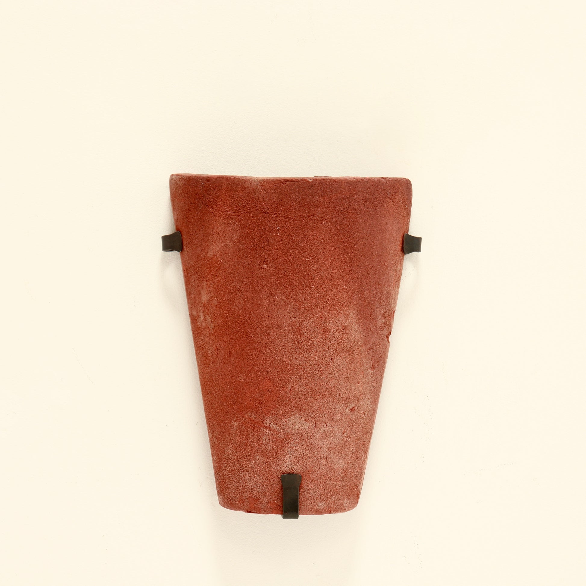 Architectural wall lighting in terracotta