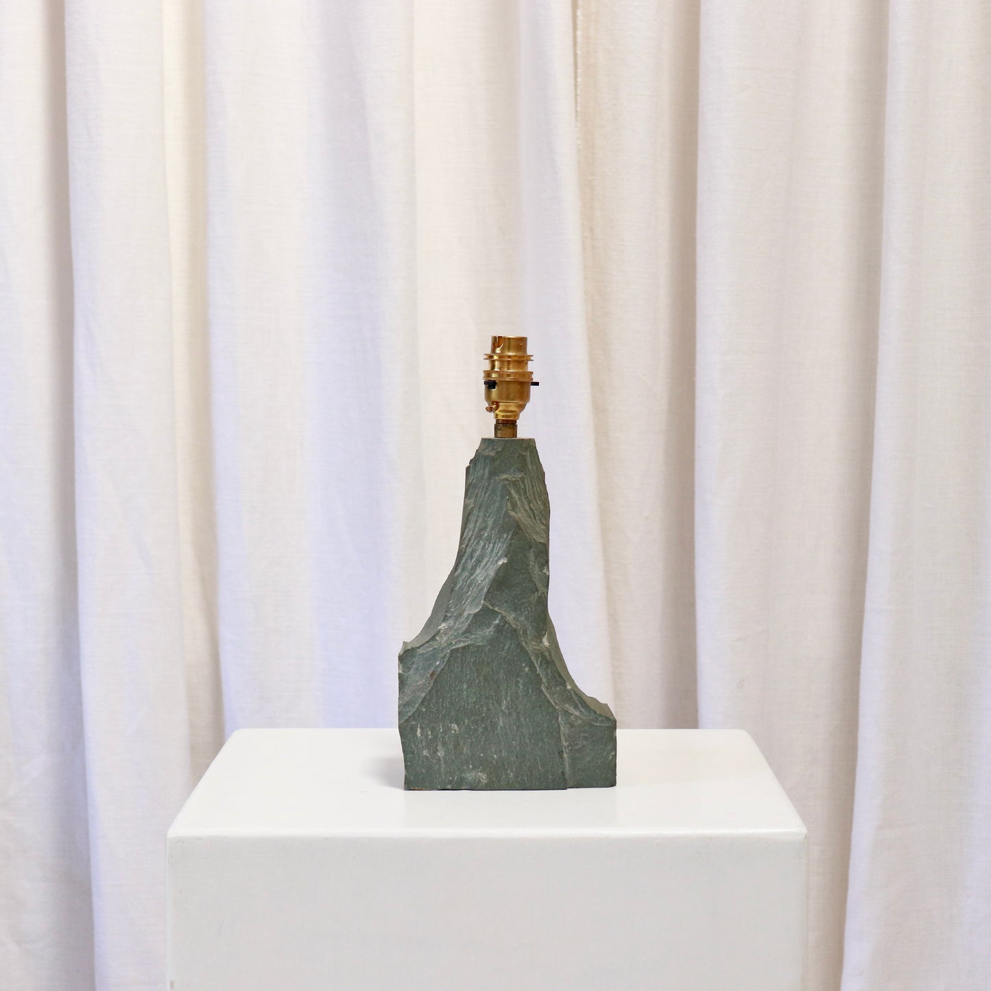 Slate lamp base with faceted, monolithic form