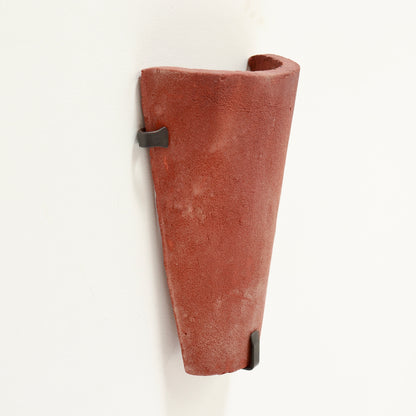 Side view of rustic terracotta wall light