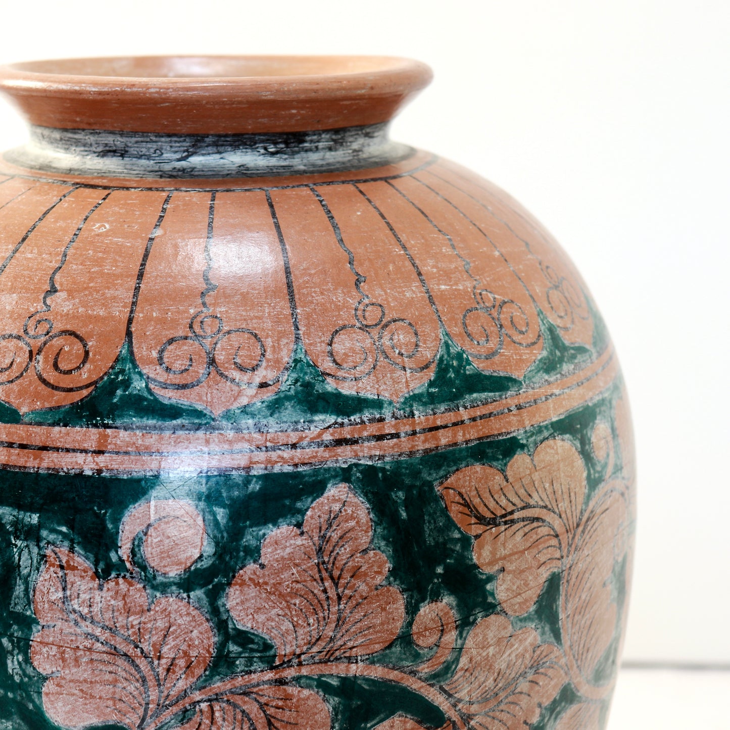 Decorative terracotta floor vase with turquoise floral motifs