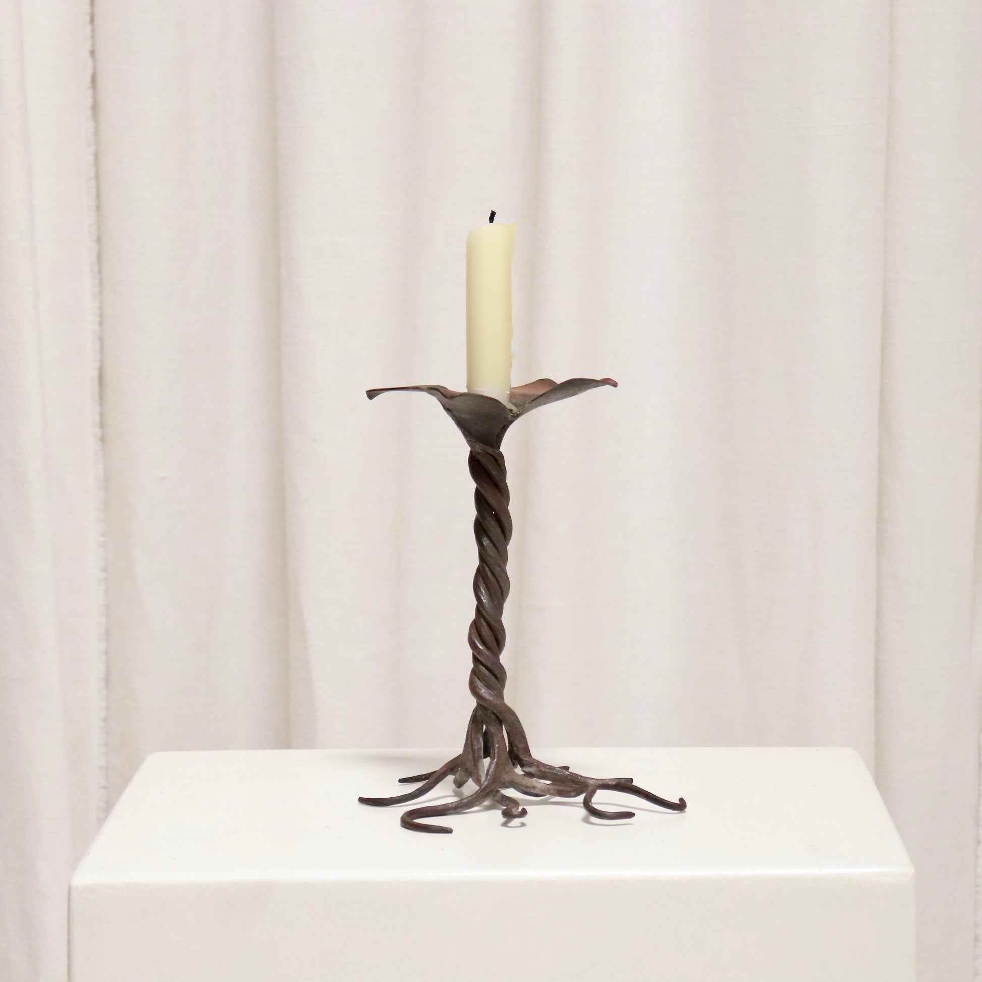 “Vintage blacksmith-made iron candle holder, 20 cm high”
