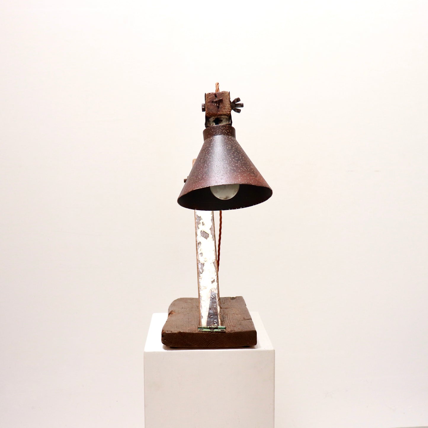 Front view of sculptural handmade anglepoise lamp