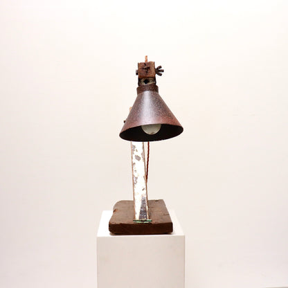 Front view of sculptural handmade anglepoise lamp