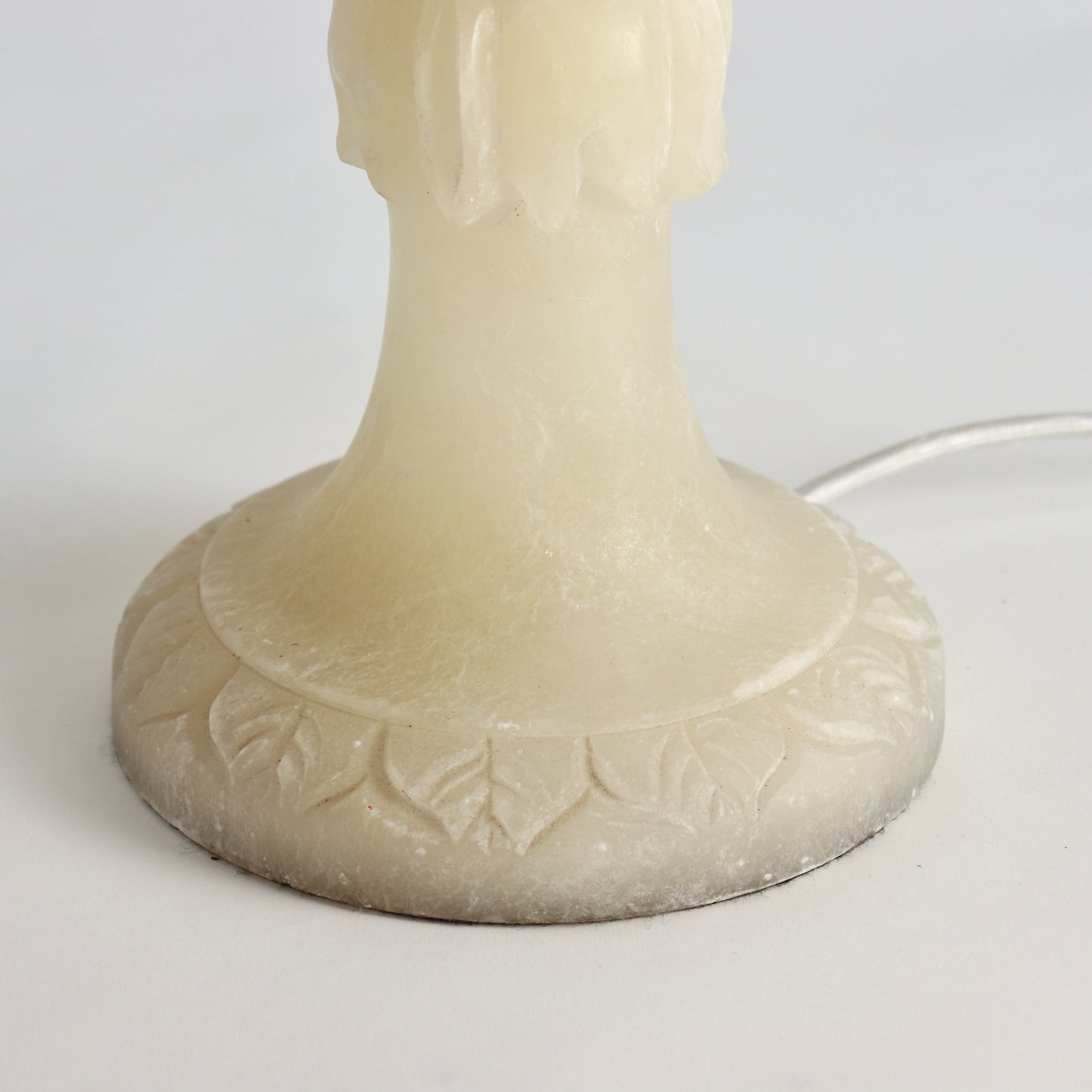 Pedestal base of carved alabaster lamp