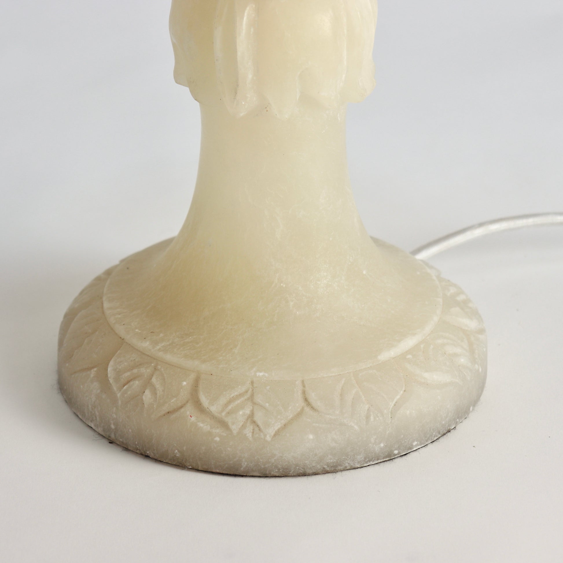 Pedestal base of carved alabaster lamp