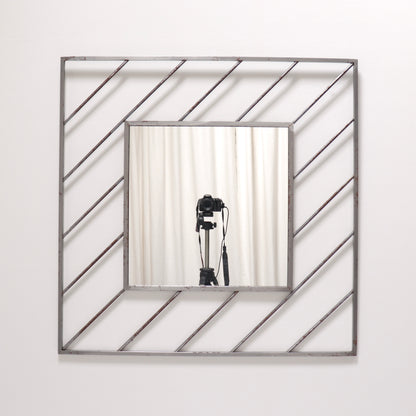 Postmodern steel mirror