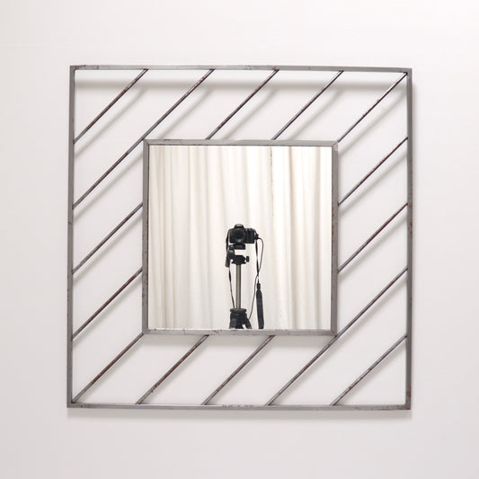 Postmodern steel mirror